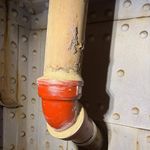 Nouveau coude en fonte DN150 installÃÂ© dans la structure mÃÂ©tallique, Paris 17