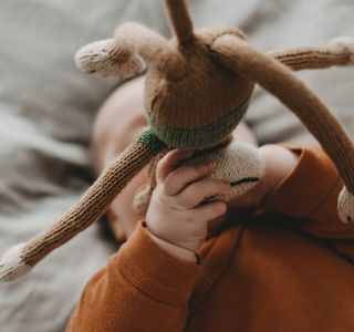 brown and white animal plush toy