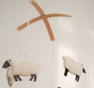 white sheep baby mobile