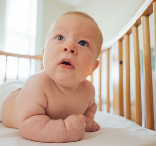 baby inside crib