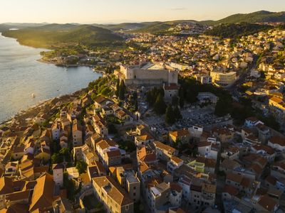 Beautiful old city of Sibenik, aerial view of the town center at sunset. Croatia
