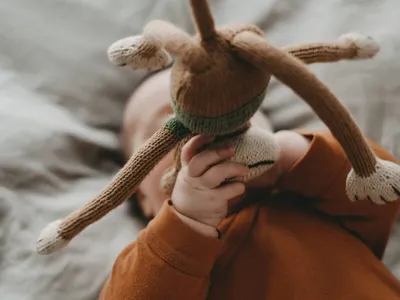 brown and white animal plush toy