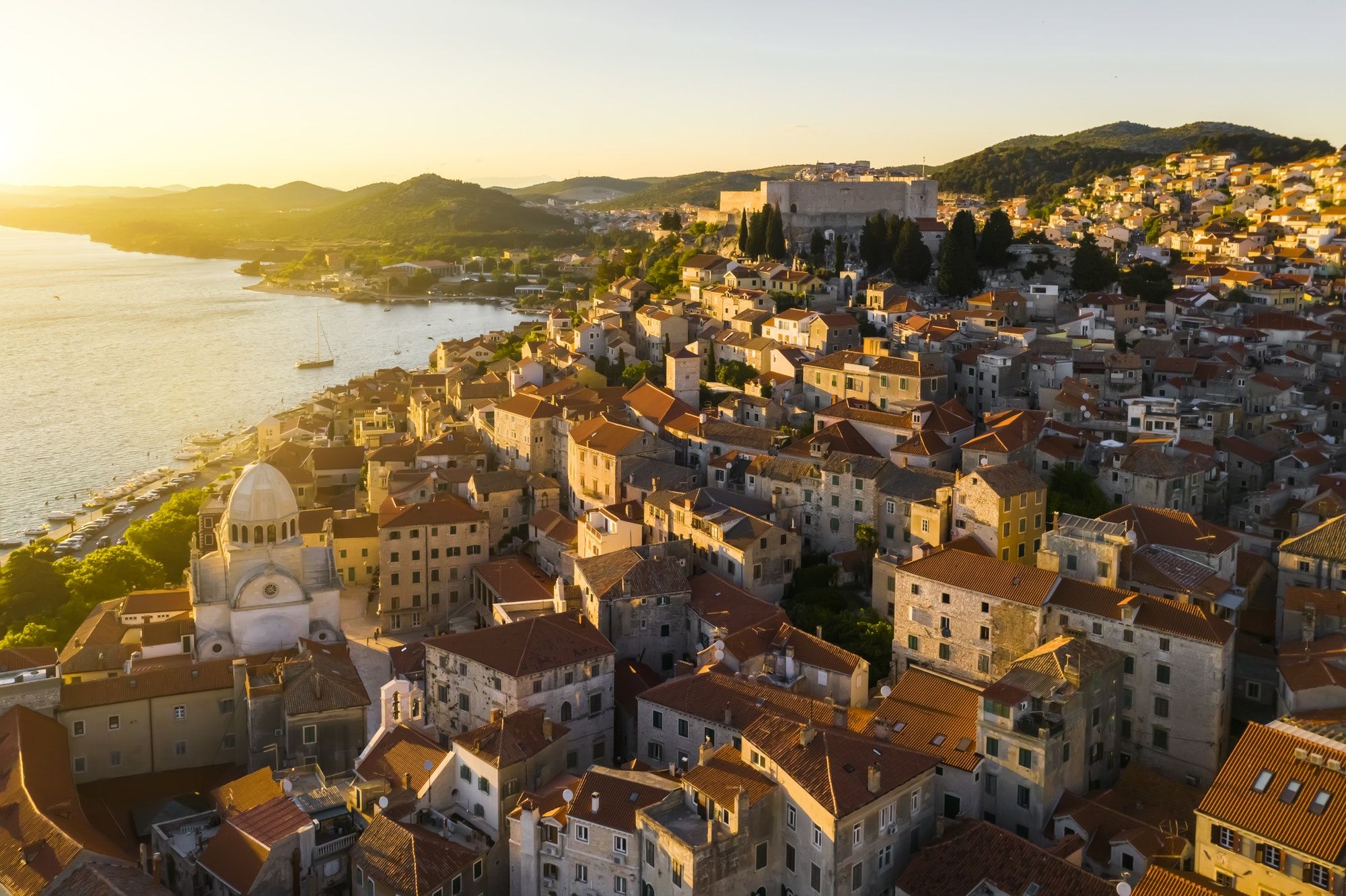 Beautiful old city of Sibenik, aerial view of the town center at sunset. Croatia.